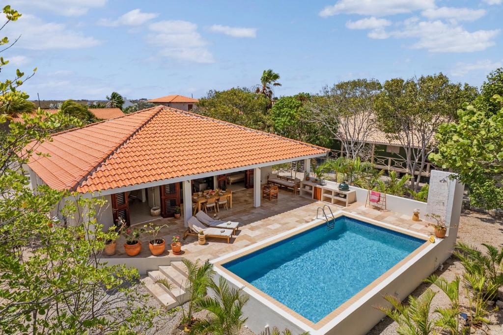 an aerial view of a house with a swimming pool at Casa del Viento Private Pool Villa near Kitesurf Beach and Sorobon in Kralendijk