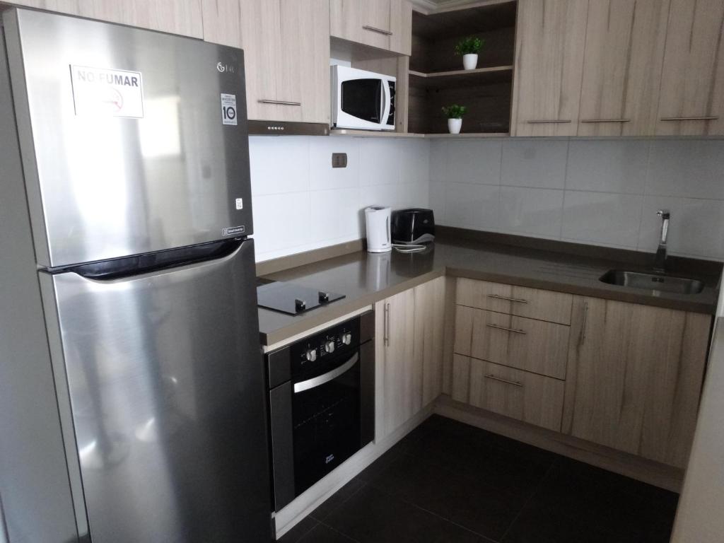 Kuchyň nebo kuchyňský kout v ubytování Tempora Apart Hotel