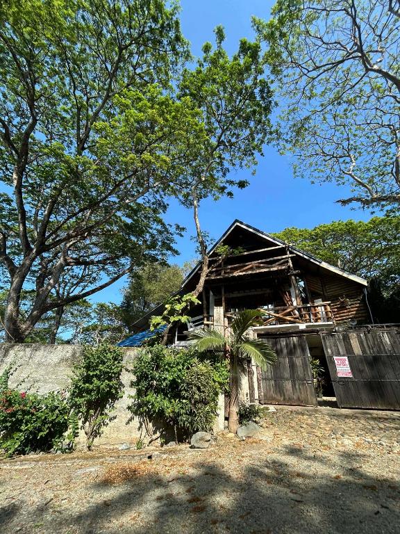 a house that has been burned down at Kuyas Tree House in Puerto Princesa City