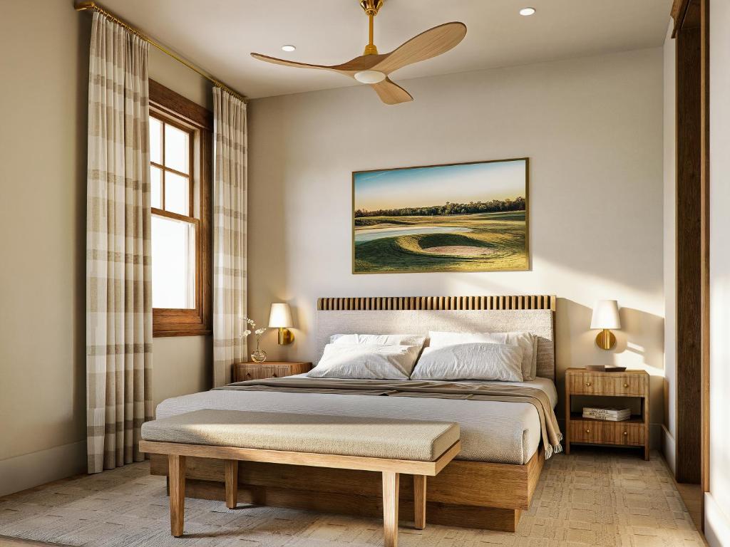 a bedroom with a bed and a ceiling fan at Tributer Resort in Mineral