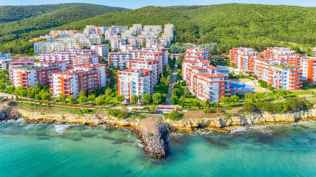 an aerial view of a city on the water at Marina and Panorama Apartments in Sveti Vlas