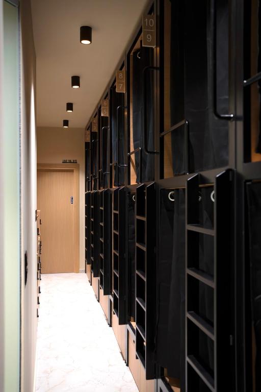 a row of lockers in a hallway at Chania Capsule Stay in Chania
