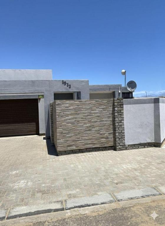 a building with a fence in front of it at Ocean Haven in Walvis Bay