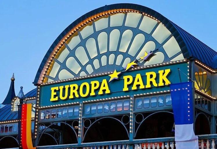 a building with a sign for a roller coaster at Mobil Home 3Ch Confort- 6Pers 15min Europa PARK in Boofzheim