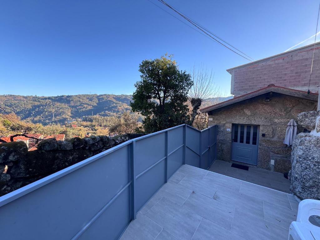 a view from the balcony of a house at Gerês Natura in Valdosende
