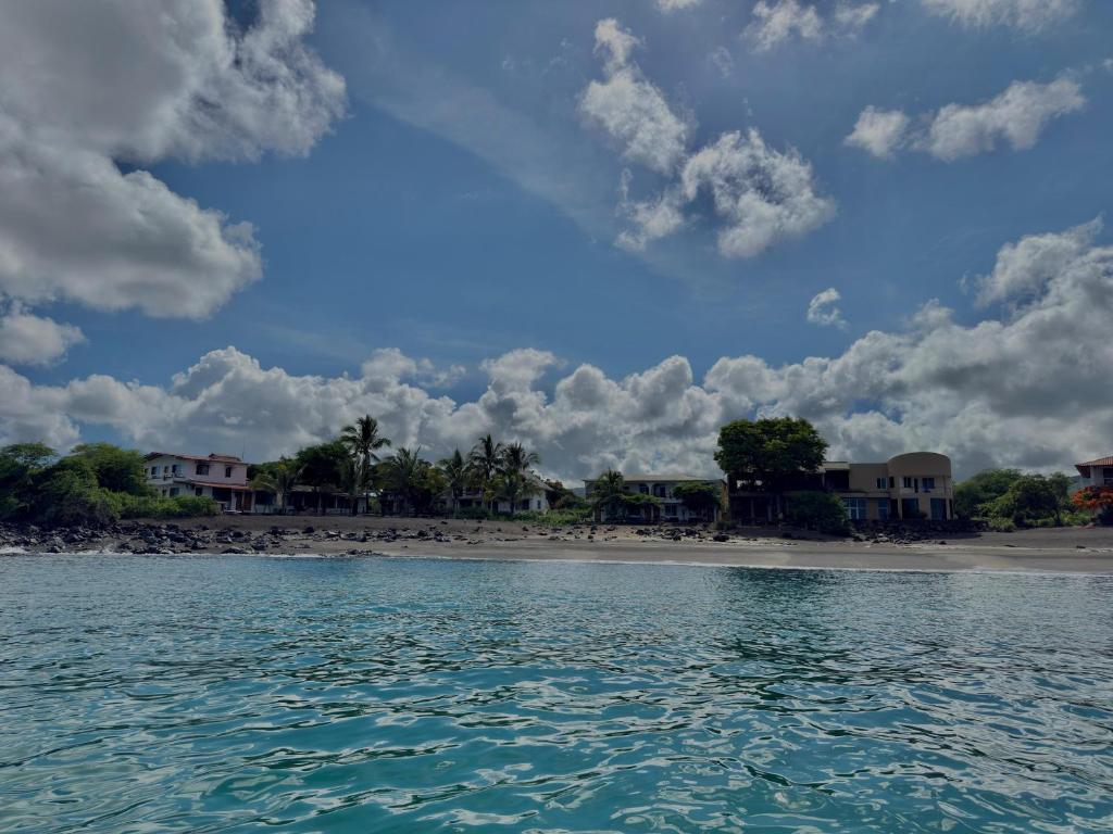 a view of a beach from the water at Hotel Witttmer in Puerto Velasco Ibarra