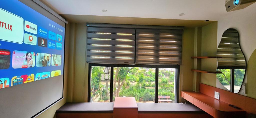 a waiting room with a large window in a building at 4Chan Phúc Đồng Apartment in Hanoi