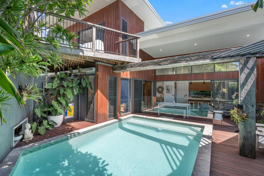an indoor swimming pool in a house at Grottamare in Lennox Head