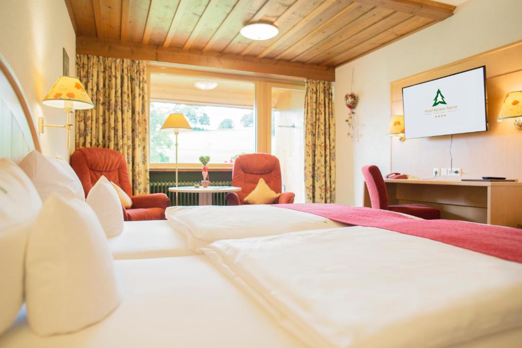 Postel nebo postele na pokoji v ubytování Kaisers Tanne - Premium Alles Inklusive Hotel