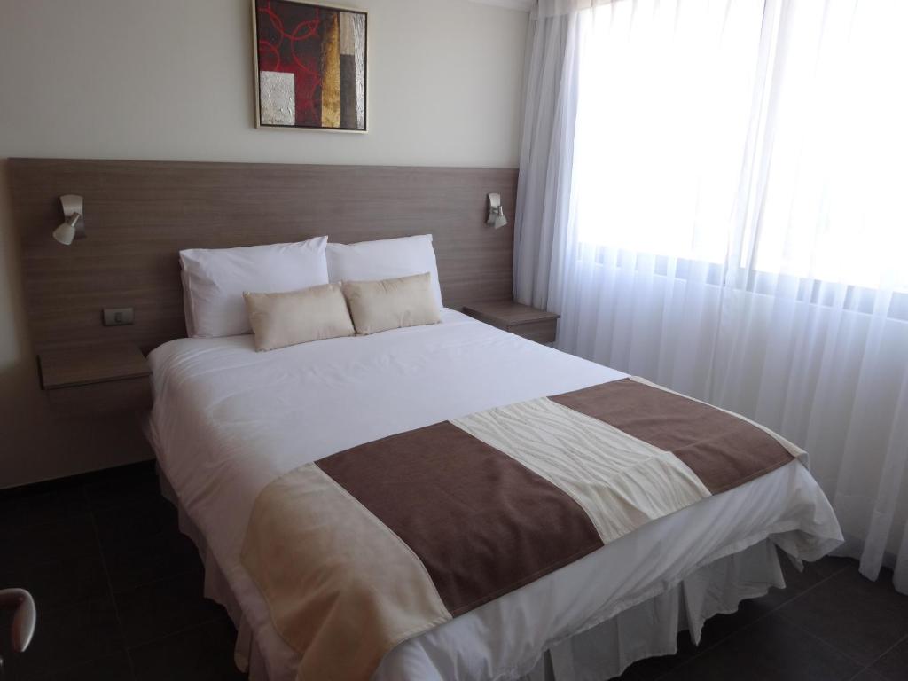 Postel nebo postele na pokoji v ubytování Tempora Apart Hotel