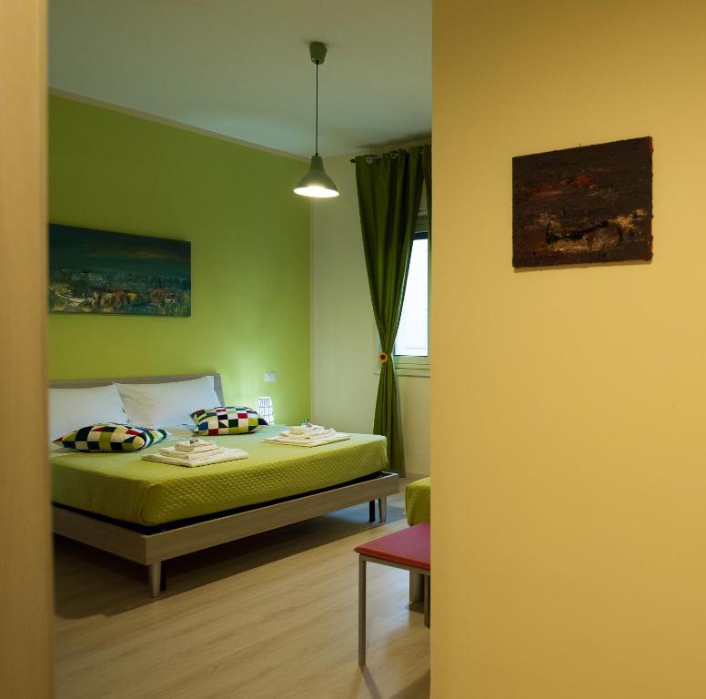 Postel nebo postele na pokoji v ubytování B&B Giunone