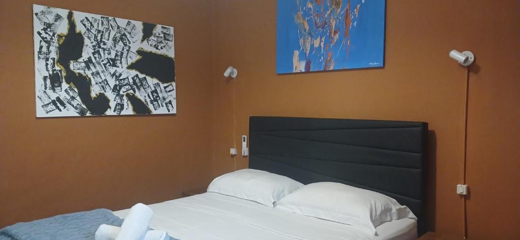 Dewi Sri Guesthouse - Deluxe Queen Room