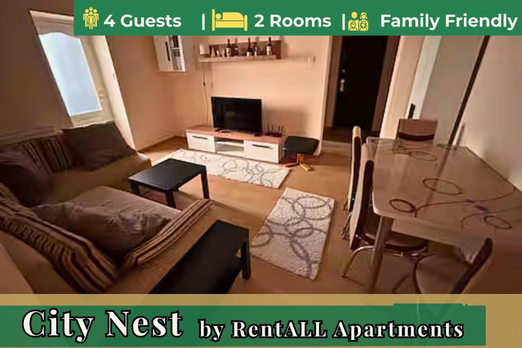 a living room with a couch and a table at City Nest by RentALL in Gheorgheni