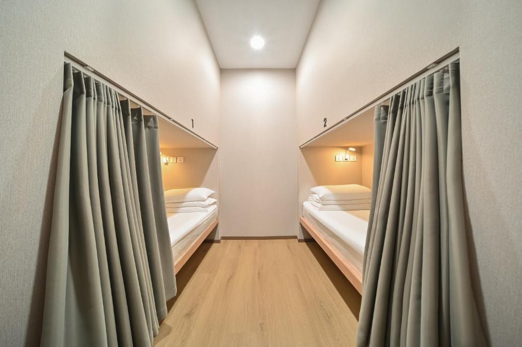Beijing Xingshe Youth Hostel - Letto Singolo In Stanza Dormitorio Femminile