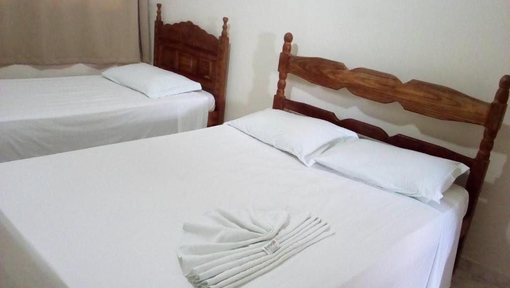 Postel nebo postele na pokoji v ubytování Hotel JB