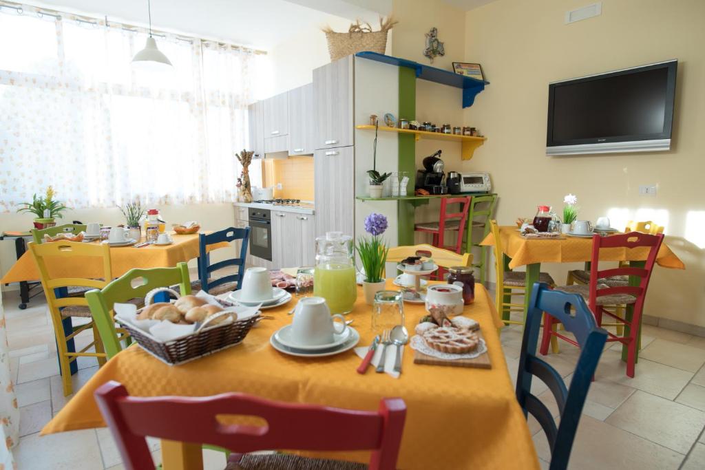 TV a/nebo společenská místnost v ubytování B&B Giunone