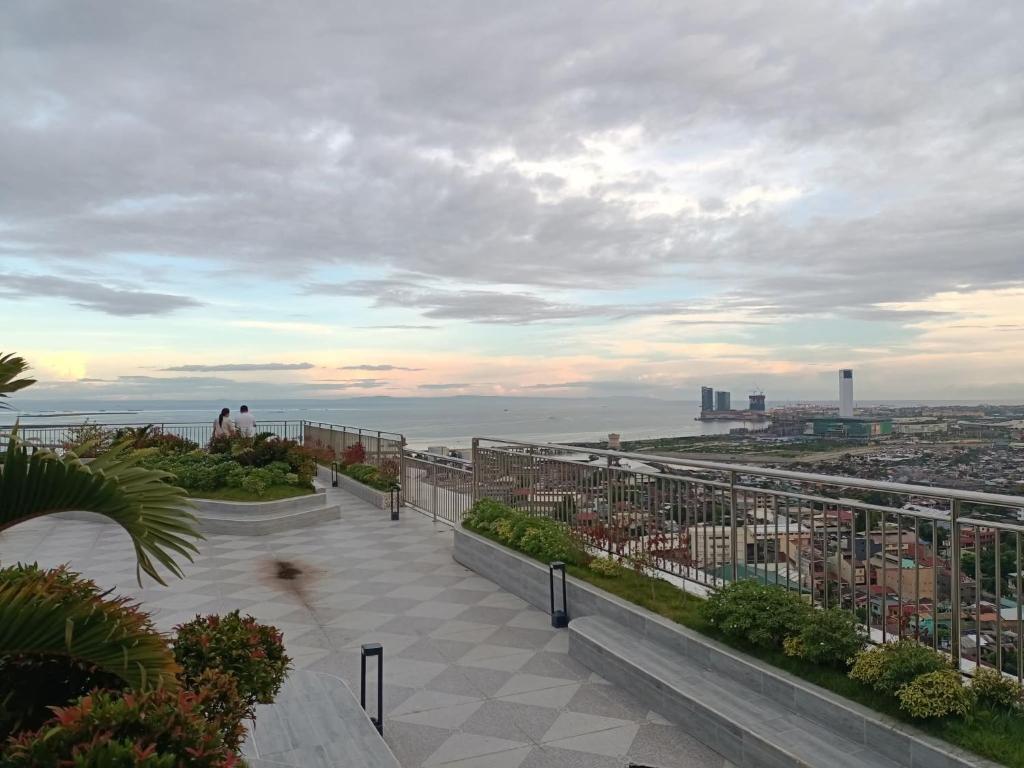 a view of the ocean from the top of a building at Arc Tower Condominium 1930 and 1727 in Cebu City