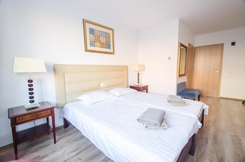 Postel nebo postele na pokoji v ubytování Hotel EKA