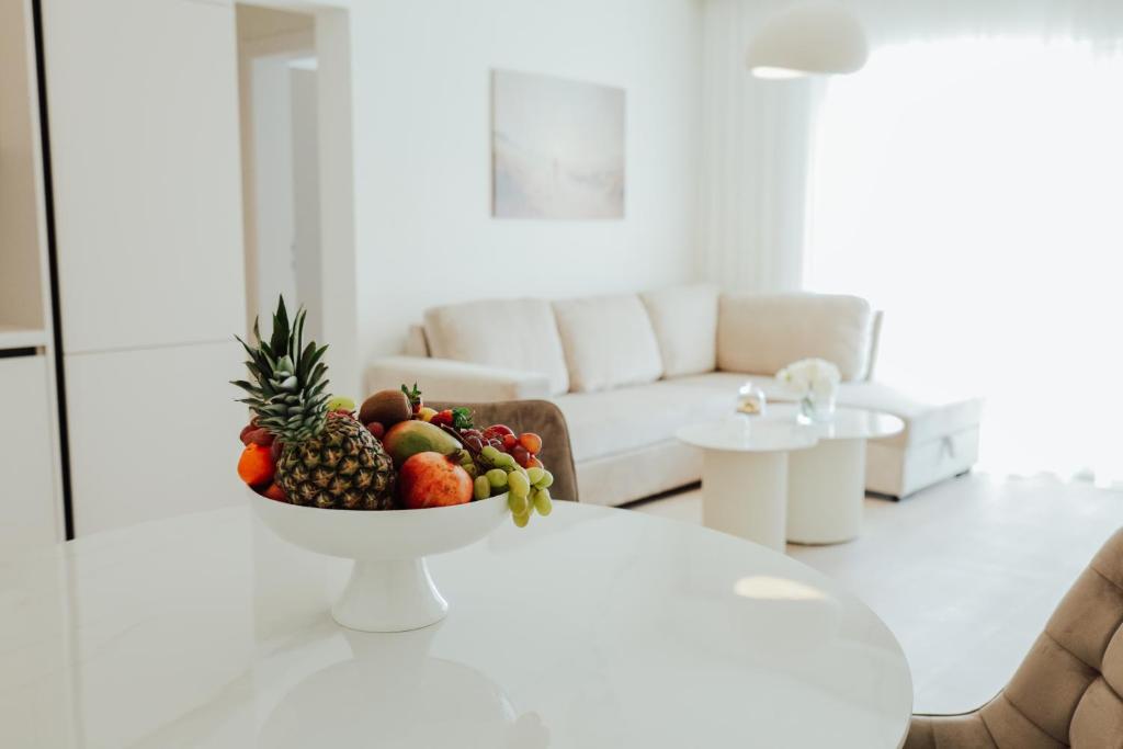 a bowl of fruit on a table in a living room at Villa Saint Hill in Međugorje