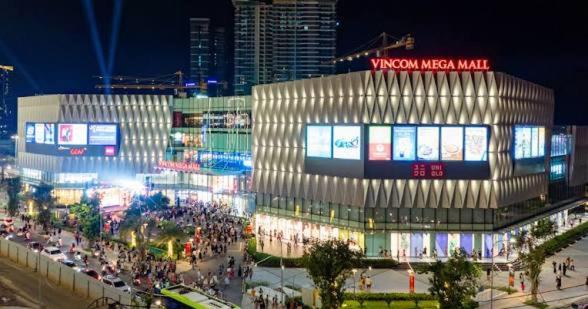 a building with a crowd of people in front of it at VHGP-Bs10 in Long Bình