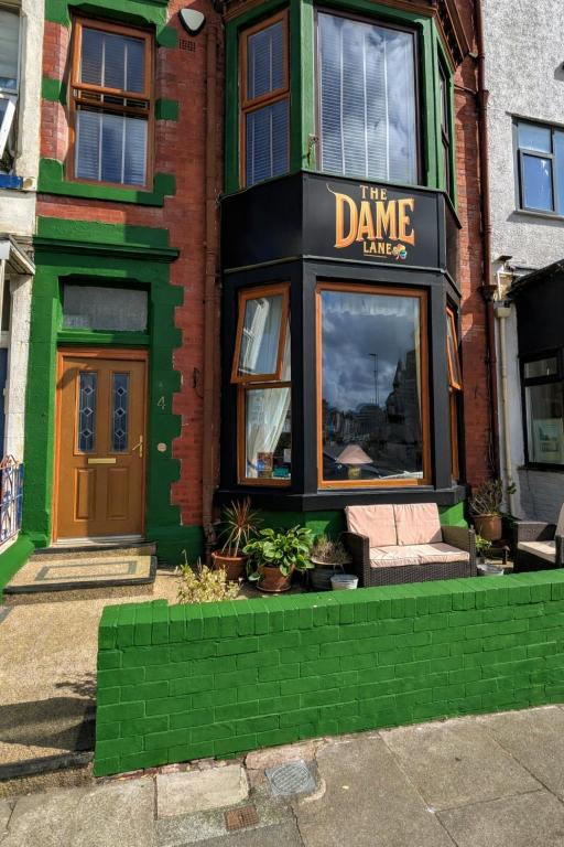 a store front with a sign that reads the dance place at The Dame Lane in Blackpool