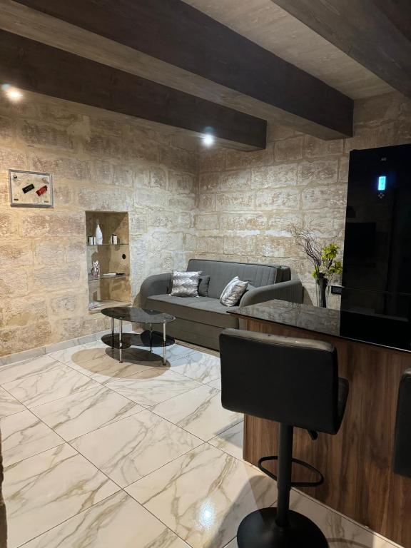 a living room with a couch and a table at rabat apartment in Rabat
