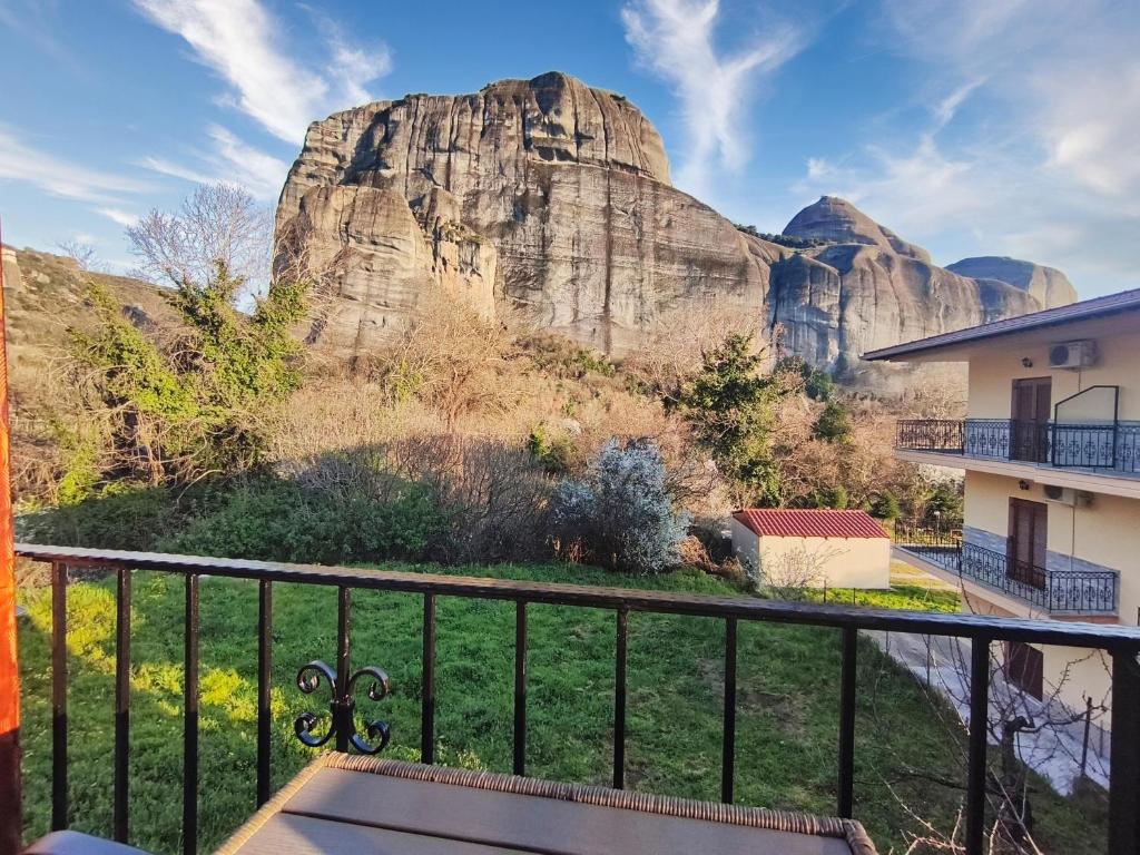 a view of the rock from the balcony of a house at Meteora Gaia in Kastraki