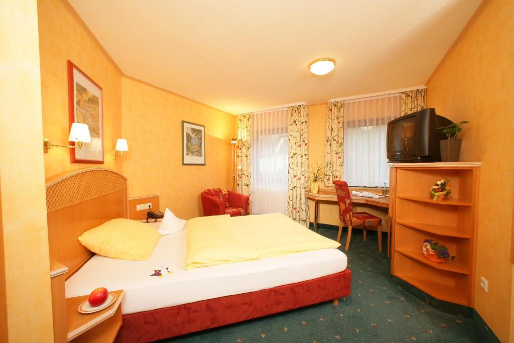 TV a/nebo společenská místnost v ubytování Ringhotel Reubel