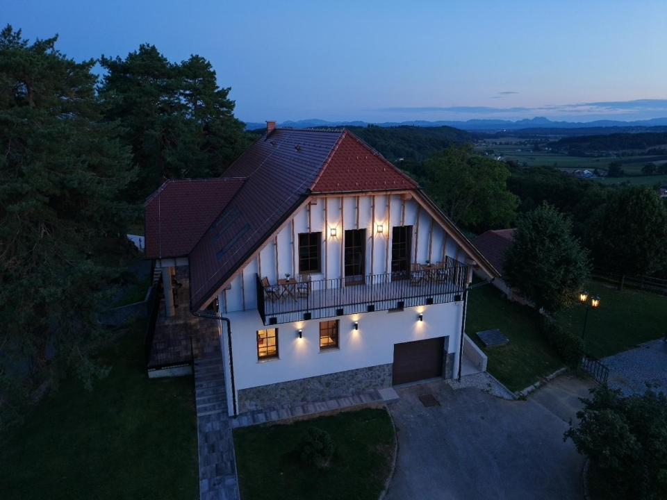 an overhead view of a house with lights on it at Vineyard Escape Herbersteinova klet in Juršinci