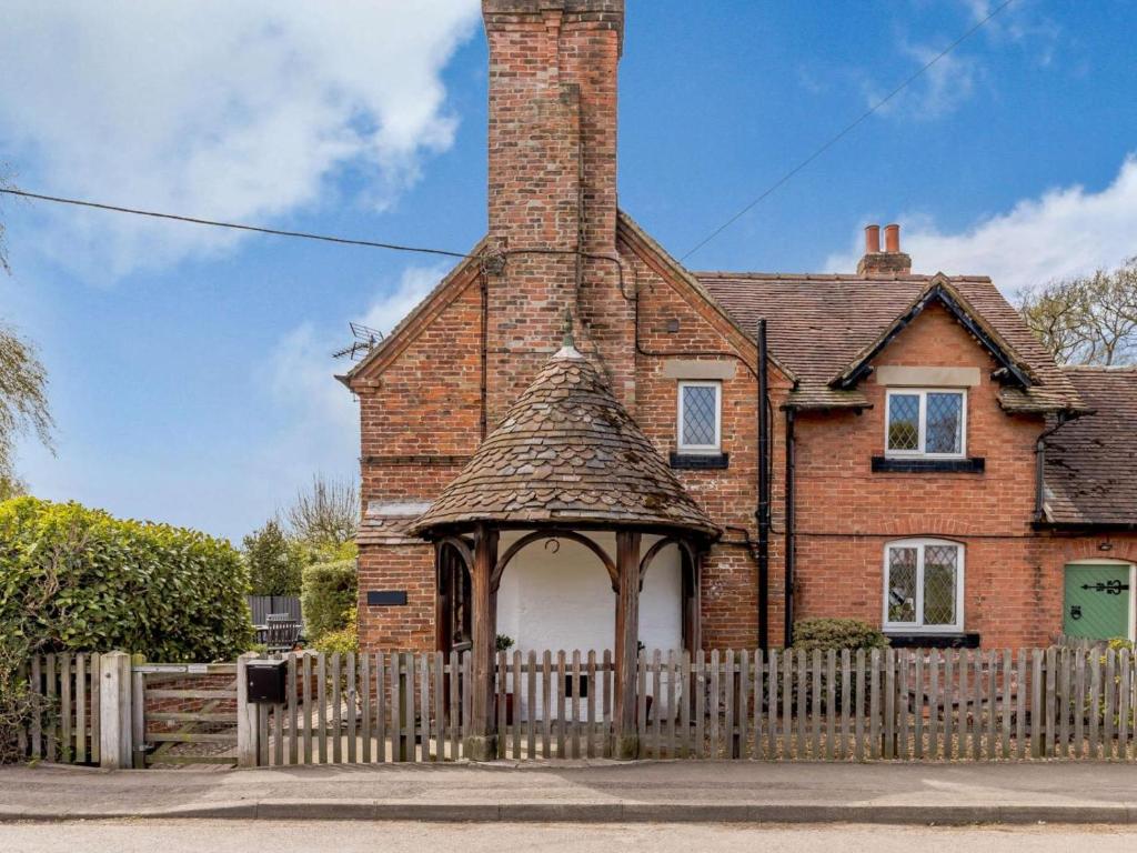 an old brick house with a gazebo at 2 Bed in Ashbourne oc-82579 in Longford