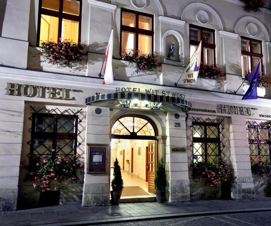 a building with an entrance to a hotel at Hotel Wit Stwosz in Krakow