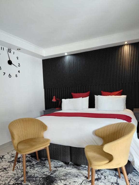 Llit o llits en una habitació de Mint Guesthouse