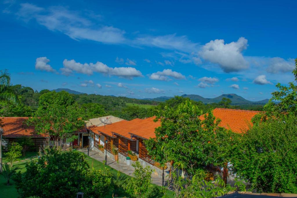 an aerial view of a house with orange roofs at Chalés Terraviva in Pirenópolis
