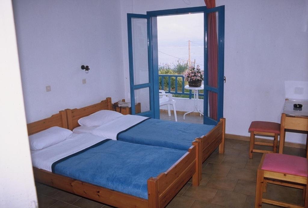 Postel nebo postele na pokoji v ubytování Friday Hotel