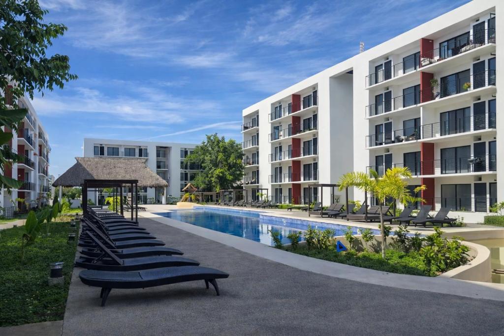 an image of a swimming pool at a hotel at Modern apartment with pool , Riviera Nayarit in Naranjo