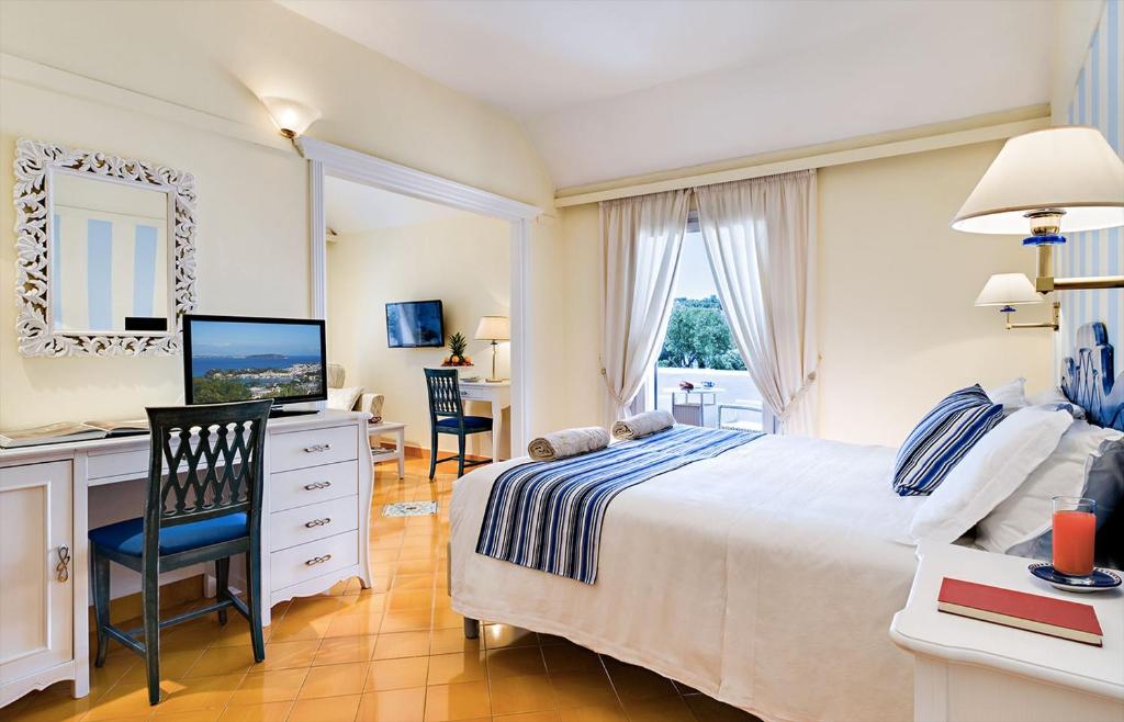 Postel nebo postele na pokoji v ubytování Hotel Mare Blu Terme