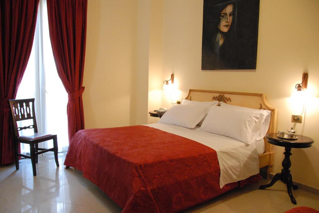 Postel nebo postele na pokoji v ubytování Garibaldi Relais