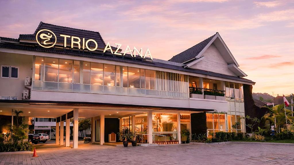 a building with a sign on the front of it at Trio Azana Resort Magelang in Magelang