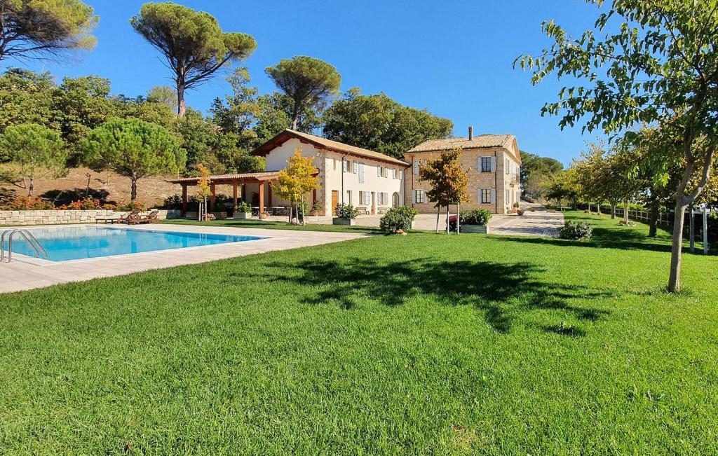 an estate with a swimming pool and a house at Az Ag Ricciarelli N in San Giuliano di Puglia
