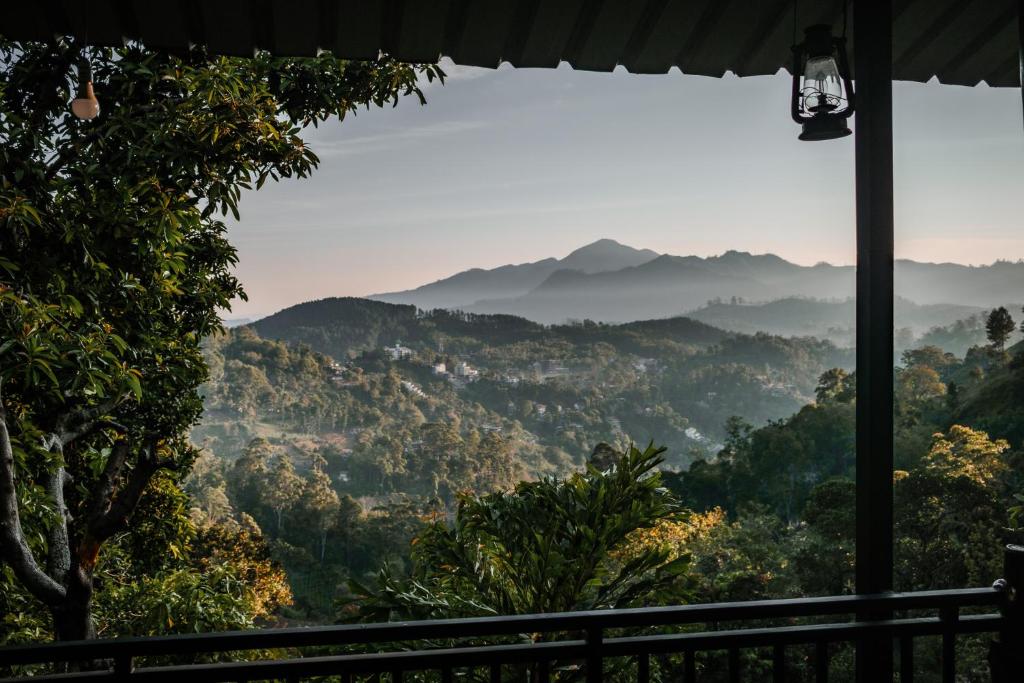 a view of a mountain valley from a window at Serene Homestay Ella in Ella