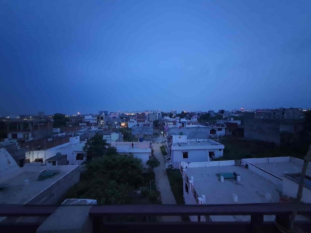 a view of a city at night at Home in Lucknow