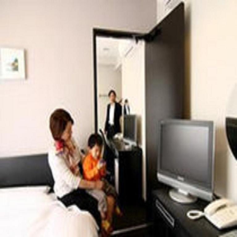 TV a/nebo společenská místnost v ubytování Hotel Crown Hills Kimitsu