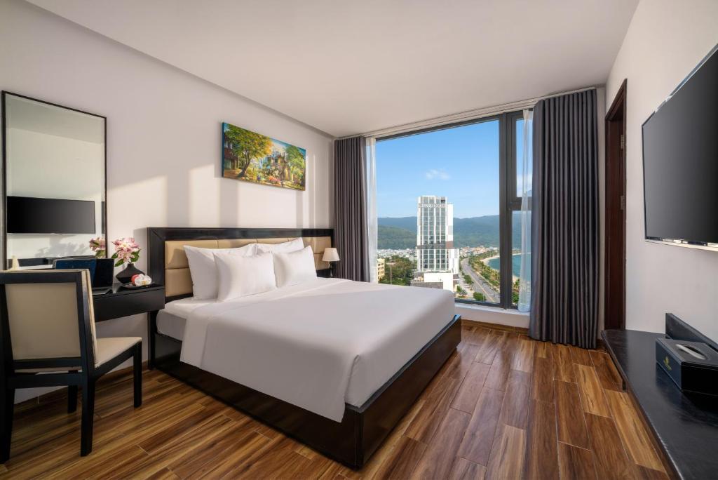 A bright double room with a large window overlooking the city and hills.