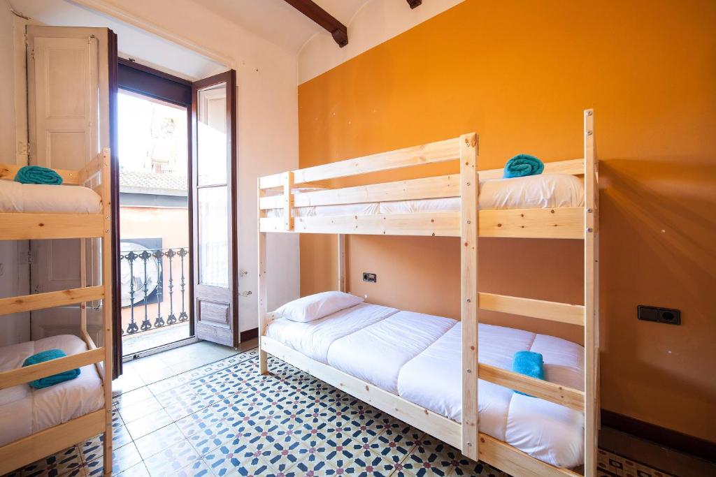 Postel nebo postele na pokoji v ubytování Bed in Girona