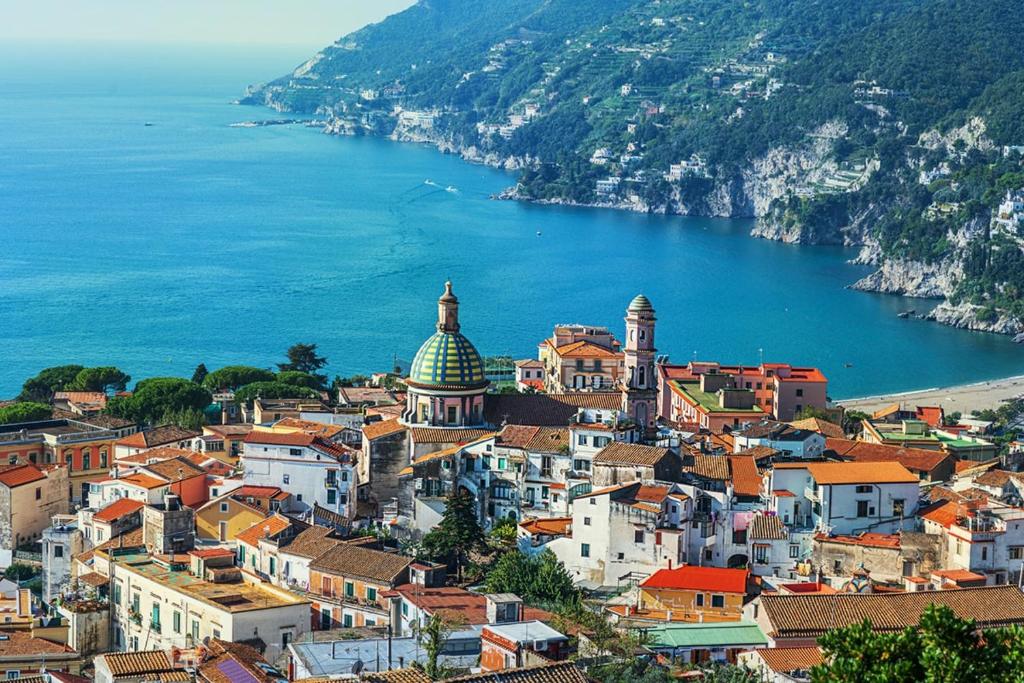 a view of a town next to a body of water at Matteo's Home in Vietri sul Mare