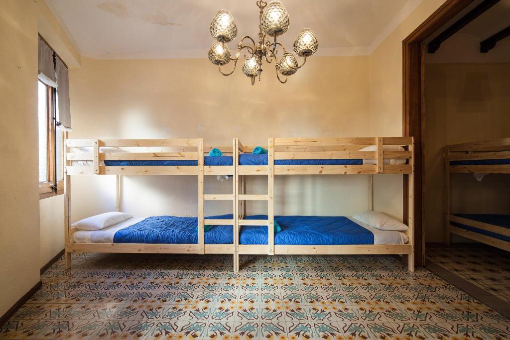 Postel nebo postele na pokoji v ubytování Bed in Girona