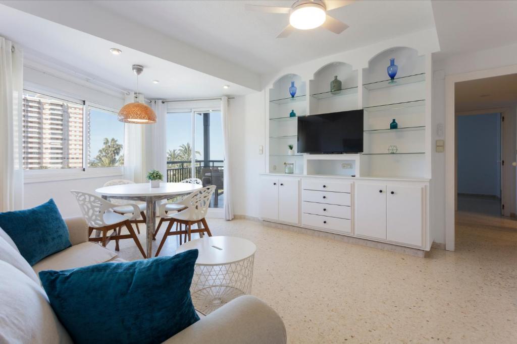 a living room with a couch and a table at AG PRESIDENTE in Playa de Gandia