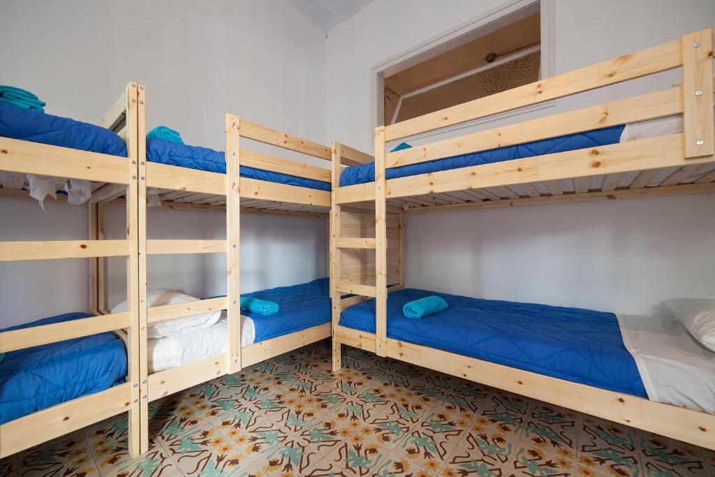 Postel nebo postele na pokoji v ubytování Bed in Girona
