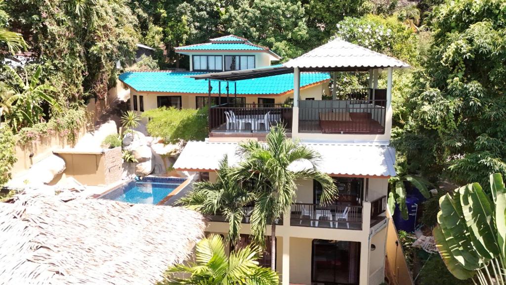an aerial view of a building with a swimming pool at Little Hill in Haad Rin