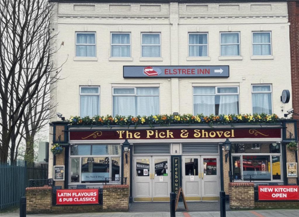 a building with a sign that reads the pick and shovel at Elstree Inn in Borehamwood